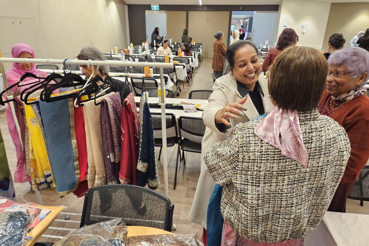 Customers browsing the Salon HiRu saree collection