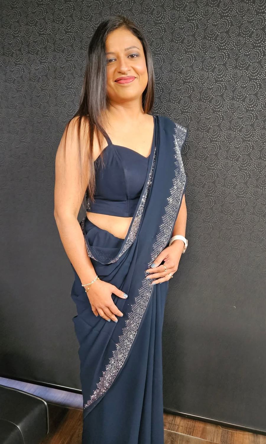 Navy saree with an embellished border