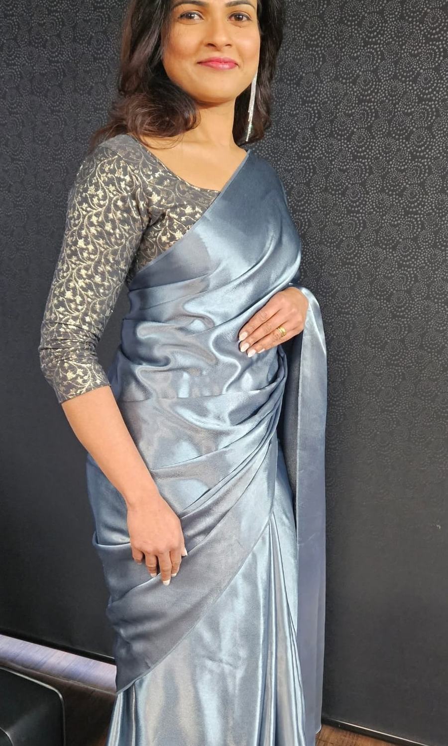Silver satin saree draped for a client