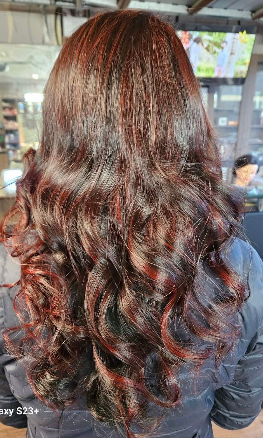Hair colour and curls finished in the salon
