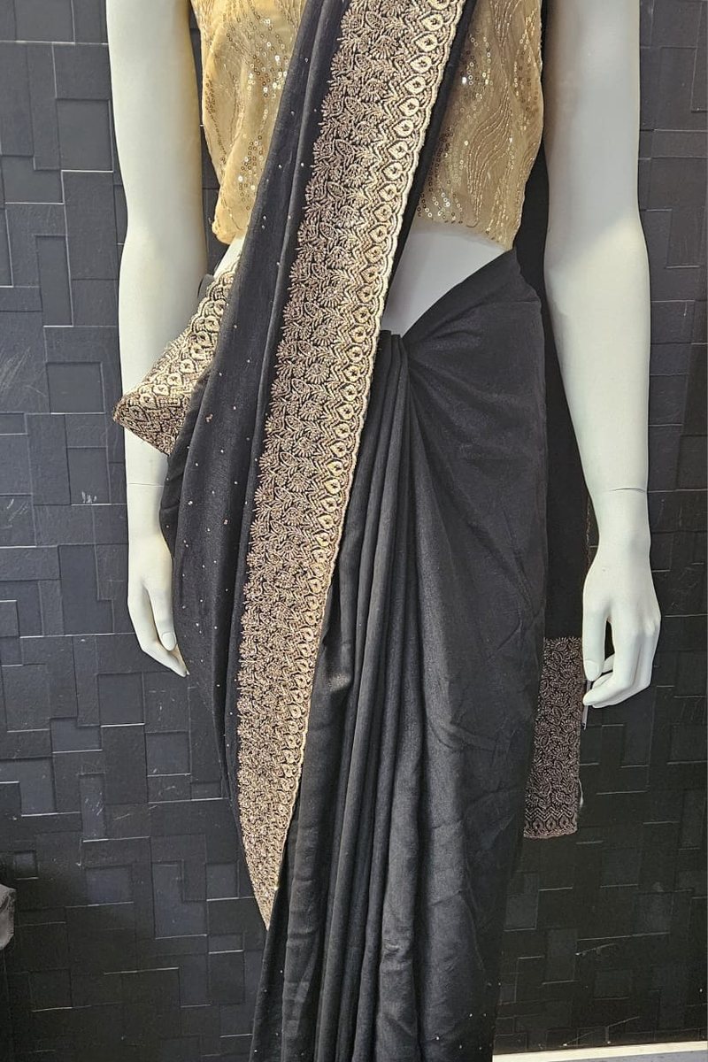 Black saree with a gold border