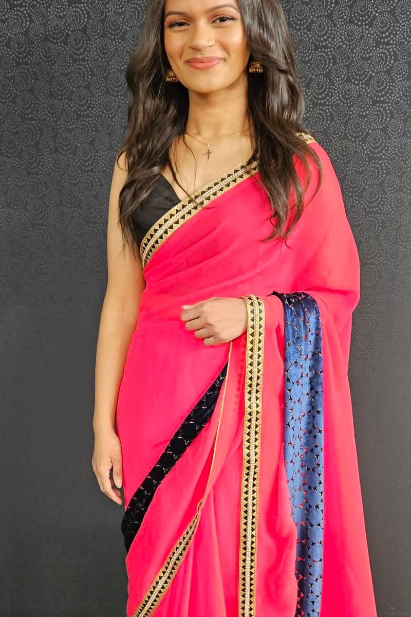Pink saree with a contrast blue border