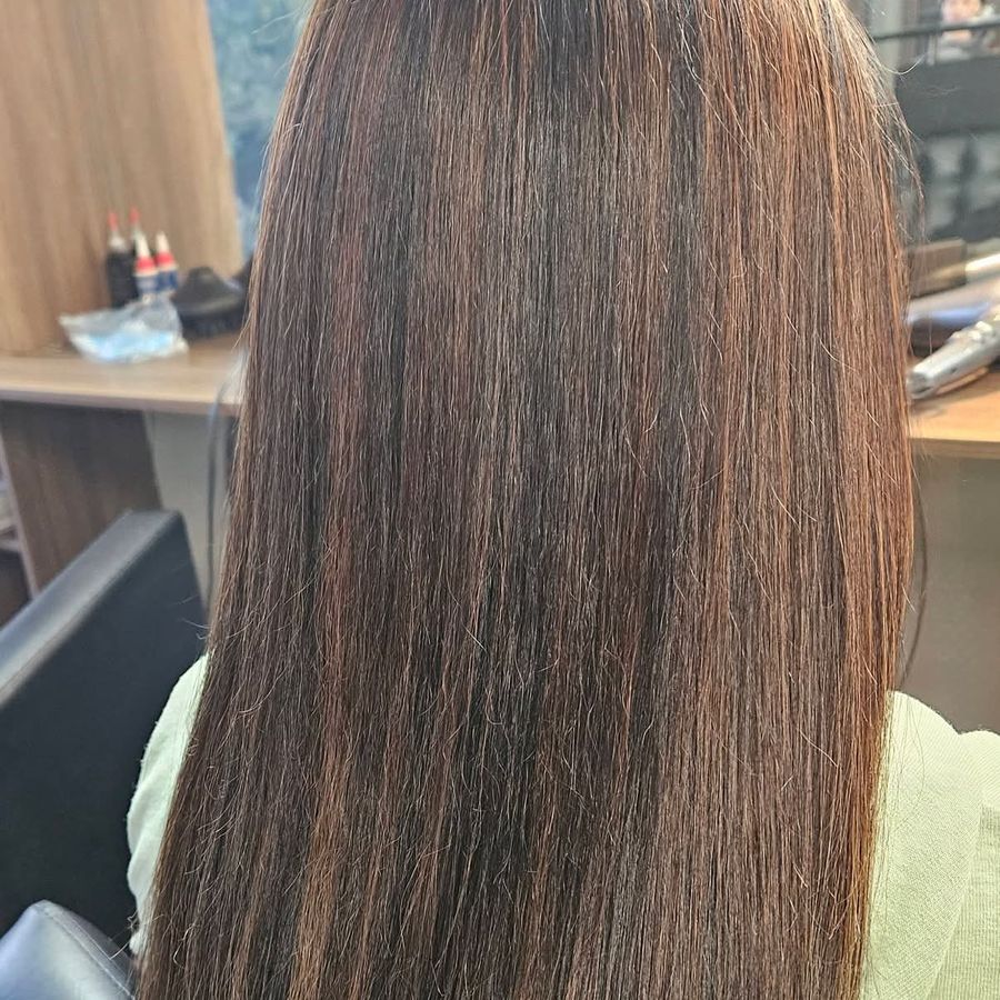 Long hair washed, straightened and finished